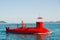 Red tourist semi-submarine at sea without capitan