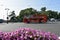 Red touristic bus on Troitsky bridge in Saint-Petersburg, Russia