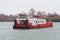 Red towboat without barges