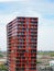 Red tower of Calypso building n Rotterdam