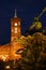 Red Town Hall in the center of Berlin at night. In the foreground you see the historic neptune fountain on which the focus lies