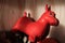 red toy rubber donkey at home