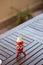 Red toy wooden vintage rocket toy on a wooden table