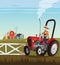 Red tractor and driver on small farm