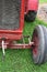 Red tractor front axle view