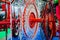 Red tractor rotary wheel hay and tedding rakes at farming exhibition