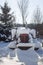 A Red Tractor in the snow