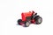 Red tractor of toys