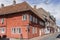 Red traditional wattle house on crossroads, Helsingor, Denmark