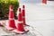 Red traffic cone on road in garden. Orange funnel use for beware car on the road in park