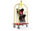 Red traffic light with hotel luggage cart