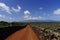 Red trail among Vineyard. Azores