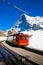 Red train of Jungfrau Bahn at Kleine Scheidegg station