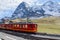 Red Train with Jungfrau Mountain, Switzerland