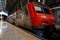 Red train wainting in Rossio Railway Station, Lisbon