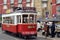 Red tram in Alfama. Lisboa. Portugal
