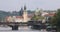 Red trams on Legion Bridge in Prague