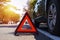 Red triangle, red emergency stop sign, red emergency symbol with  car stop and park on road