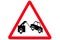 A red triangular vehicle towing sign