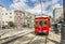 red trolley streetcar on rail in New Orleans French Quarter