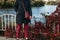 Red trousers and red leaves of plants