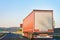 Red Truck in the alphalt road of Poland