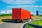 Red Truck on the alphalt road of Poland