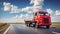 Red truck on blurry asphalt road over blue cloudy sky