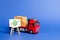 Red truck loaded with boxes and stand with a green dollar up arrow. Raise economic indicators and sales. Exports imports