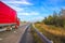 Red truck moving on a highway