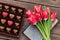 Red tulip flowers and chocolate box