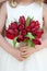 Red tulip wedding bouquet