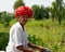 Red Turban man on a moto in Rajasthan