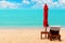 Red umbrella, deck chair, solar parasol, sun lounger, chaise lounge, sun bed, tropical island sea beach, summer holidays, vacation