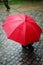 Red umbrella in rainy day