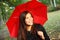 Red umbrella woman