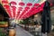 Red umbrellas above the restaurant in old bohemian part of Belgrade Serbia