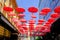 Red umbrellas above the restaurant in old bohemian part of Belgrade Serbia