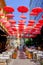 Red umbrellas above the restaurant in old bohemian part of Belgrade Serbia