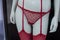 red underwear with little hearts on mannequin in a fashion store showroom