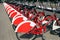 Red urban bicycles parked in european city