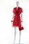 Red v-neck dress on mannequin.