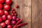 The red vegetables on wooden table