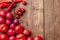 The red vegetables on wooden table