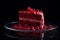 red velvet cake slice with raspberries