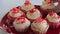 Red velvet cupcake. The finished cakes are on the plate. Close-up.