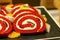 Red Velvet roll on plate background