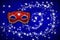 Red Venetian carnival mask on a blue background.