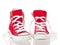 Red vintage canvas sneakers untied