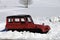 Red vintage snow plow